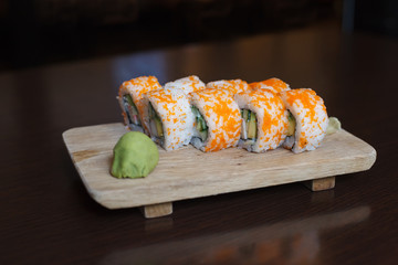 Sushi role on wooden board. Japan cuisine