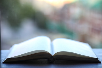 open book and a table