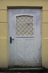 Old white dirty not tall  door