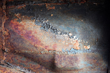 metal old background shabby and scratched and from time rusty with shabby paint