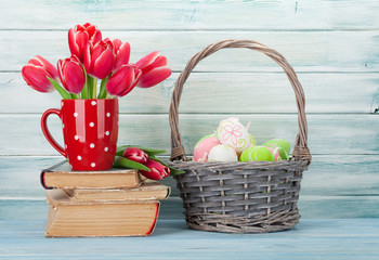 Red tulip flowers and easter eggs