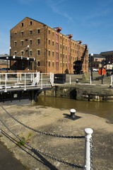 Spring sunshine on the industrial heritage travel destination of Gloucester Docks, Gloucester, UK