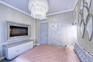 Modern interior of a bedroom in the new house.