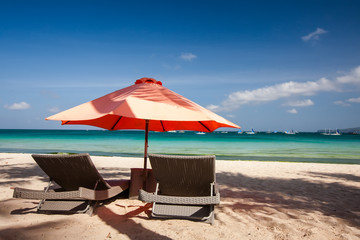 Chaise longues at the beach on the Boracay island, Philippines