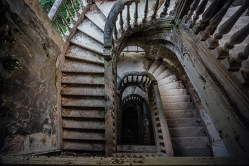 Papier Peint photo Escaliers Top view of old vintage decorated staircase in abandoned mansion