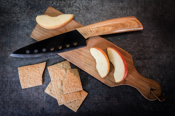 Apple slices on a cutting board