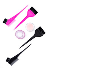 Dye hair in beauty salon. Set of brushes on white background top view space for text