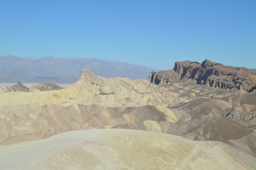 Fototapeta na wymiar Zabriskie Point. Stunning Yellow Rock Desert. Travel Holidays Geology. June 28, 2018. Death Valley California. EEUU. USA.