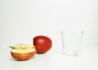 Apple and a glass of water, just a relaxing quite picture