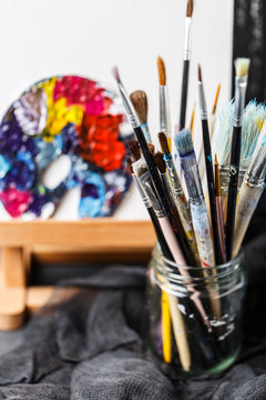 Artistic equipment.  Brushes and paints for drawing. Items for children's creativity.