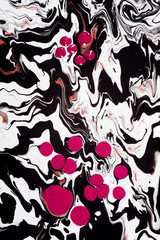 Abstract painting of gouache paints, forming swirly, flashy, turning patterns 