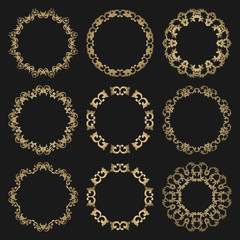 Set round openwork gold frames on black background.