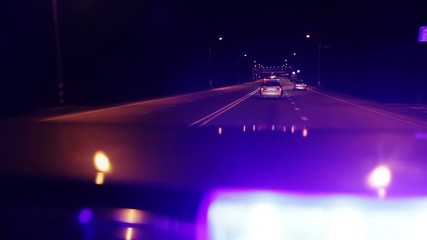 point of view police car top turning lights