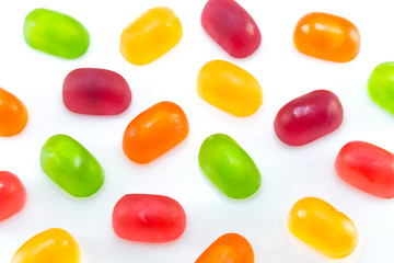 Fruit gummi or jelly candies assortment on white