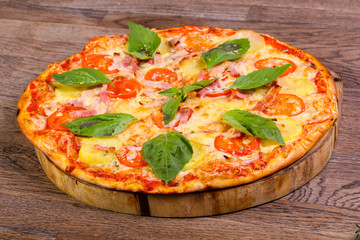 Pizza with ham and potato