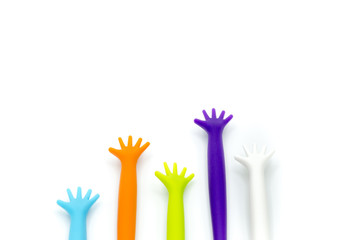 Obraz premium Colorful plastic hands raise up, voting isolated on white background, participate concept.