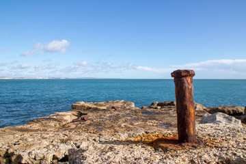 Rusted Post on Coast