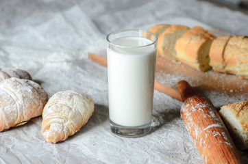 Still life of milk and bread products.