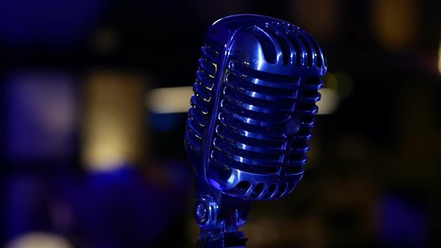 Old microphone in the club. Soft refocus, easy forward and backward movement