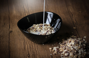 flakes in a bowl on a wooden table