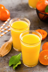 Mandarin orange juice. Refreshing summer drink. Fruit refreshment beverage