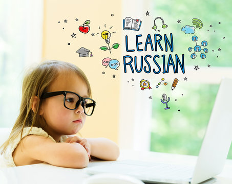 Learn Russian text with little girl using her laptop