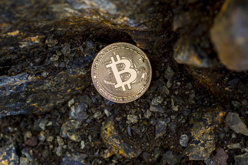 bitcoin on the stone background