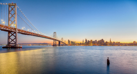 San Francisco skyline with Oakland Bay Bridge at sunset, California, USA © JFL Photography