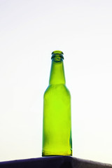 Empty beer bottle isolated on white background