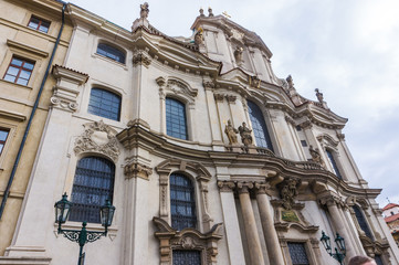 Fototapeta na wymiar St.Nicholas Church in the quarter of Mala Strana in Prague in Central Europe, facade of Baroque architecture