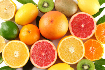 Naklejka na ściany i meble healthy food. mix lemon, green lime, orange and grapefruit with green leaf isolated on white background