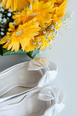 Bridal shoes  bouquet flowers