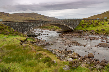 Fototapeta na wymiar Old Stone Bridge on the Isle of Skye, Scotland