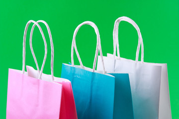 close up of colorful paper shopping bags