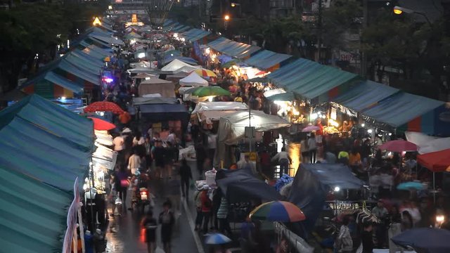 Crowds at shopping street market in Bangkok, Thailand. time lapse
