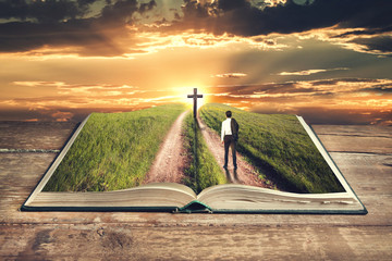 open bible cross and man in sky - obrazy, fototapety, plakaty