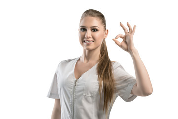 Beautiful nurse in white uniform cropped portrait