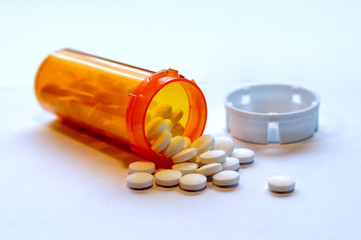 Opioid Crisis - Open Prescription Bottle of Pain Killers