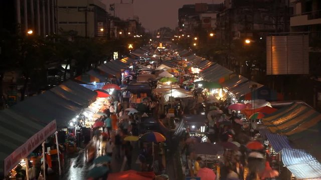 Crowds at shopping street market in Bangkok, Thailand. time lapse