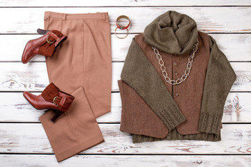 Set of female fashionable autumn apparel. Flat lay elegant clothes for adult women. Feminine...