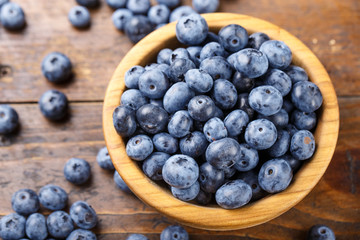 bog whortleberry on a wooden background