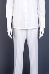 White striped trousers for women. White cotton shirt for women. Designers clothes for ladies.