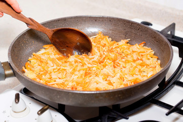 Frying pan with roasted vegetables for borscht