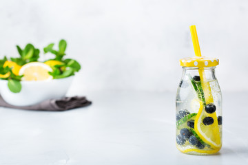 Fresh cool lemon cucumber berry infused water detox drink