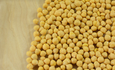 Close up of canned garbanzo beans vegetable with wood background