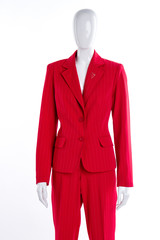 Red jacket and trousers for women. Female mannequin dressed in red formal suit. Female business style.