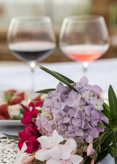 Table on the terrace prepared for a romantic dinner