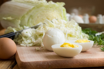 Healthy salad corn, cabbage.Eggs boiled on vegetable salad.
