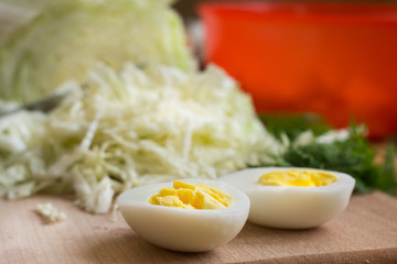 Healthy salad corn, cabbage.Eggs boiled on vegetable salad.