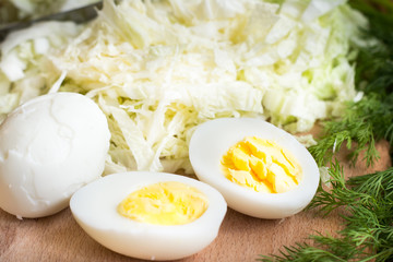 Healthy salad corn, cabbage.Eggs boiled on vegetable salad.